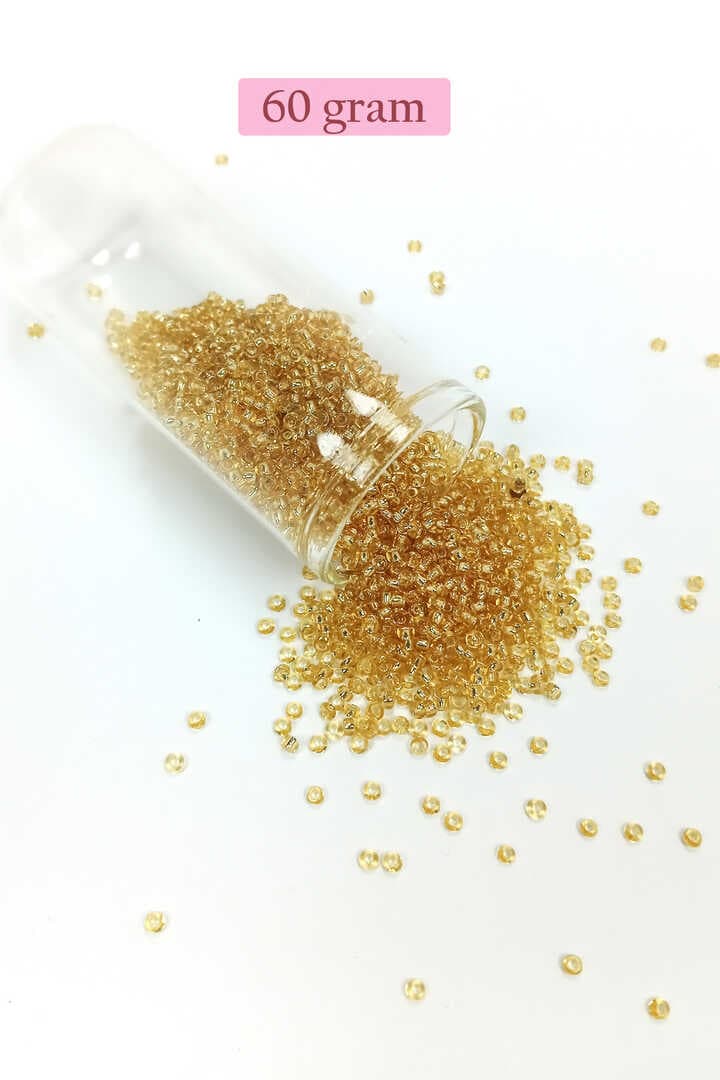 Dökme Cam Kum Boncuk (11/0) 2 mm - 60 Gram -  Şeffaf Bal Rengi - BNC068