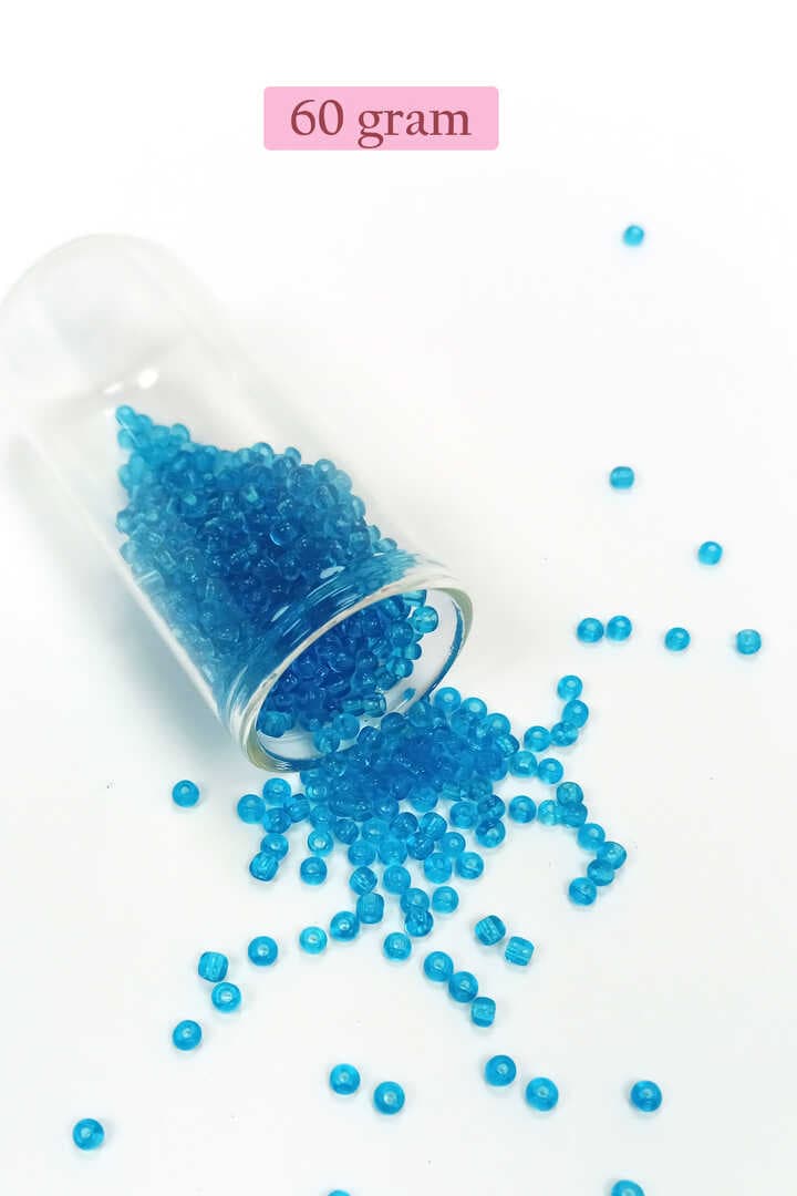 Dökme Cam Kum Boncuk (8/0) 3 mm - 60 Gram - Şeffaf Deniz Mavi - BNC221